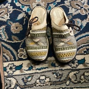 Used women’s multi colored Born mules size 8